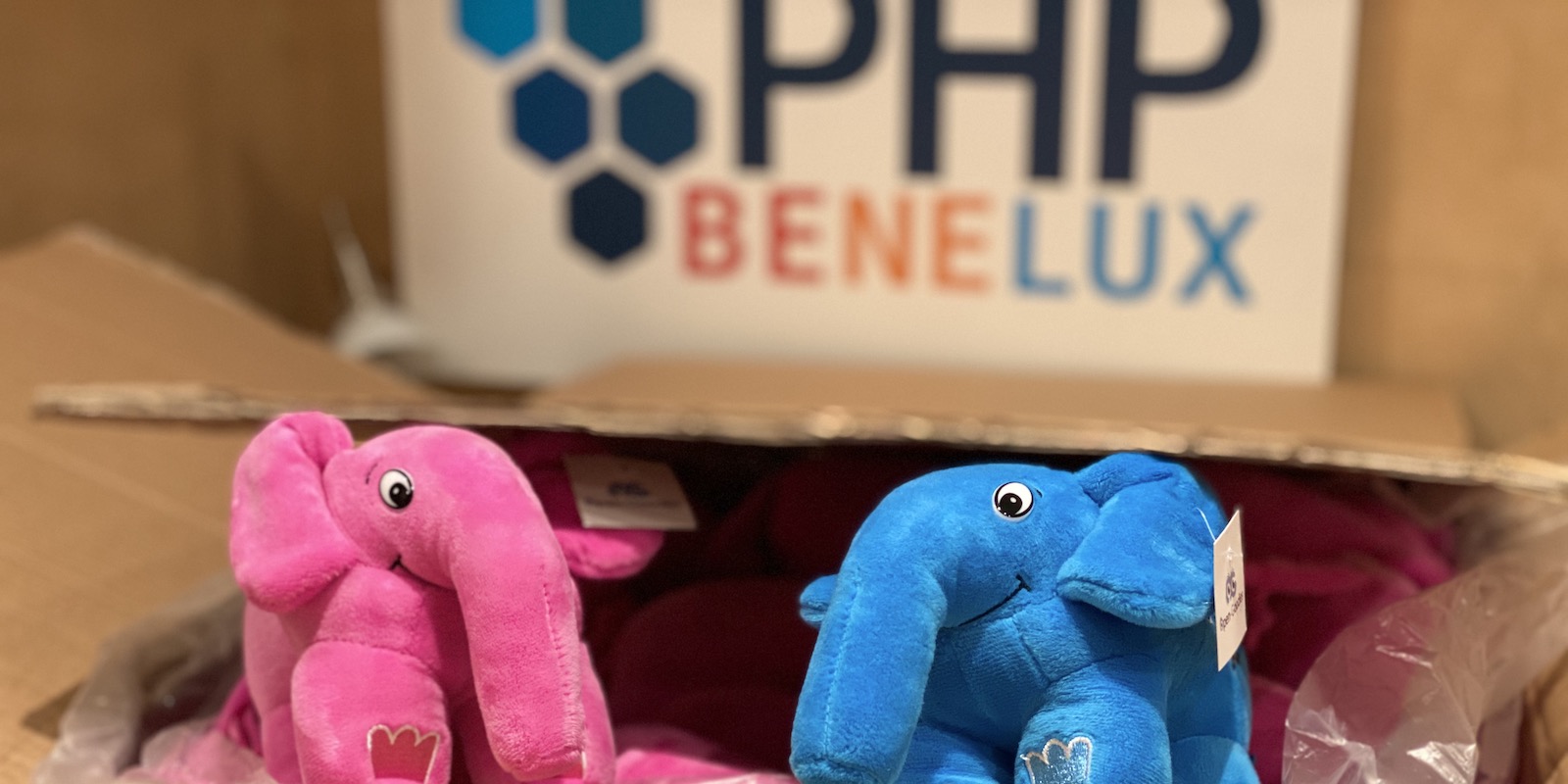 PHP mascot elephant in front of PHPBenelux sign